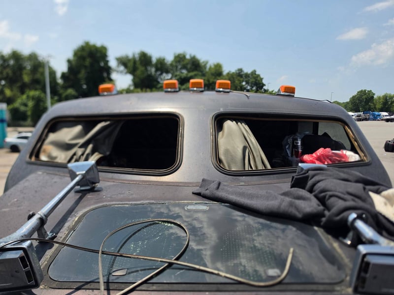 Windshield opening on a heavy truck cab with the old glass and urethane cut away